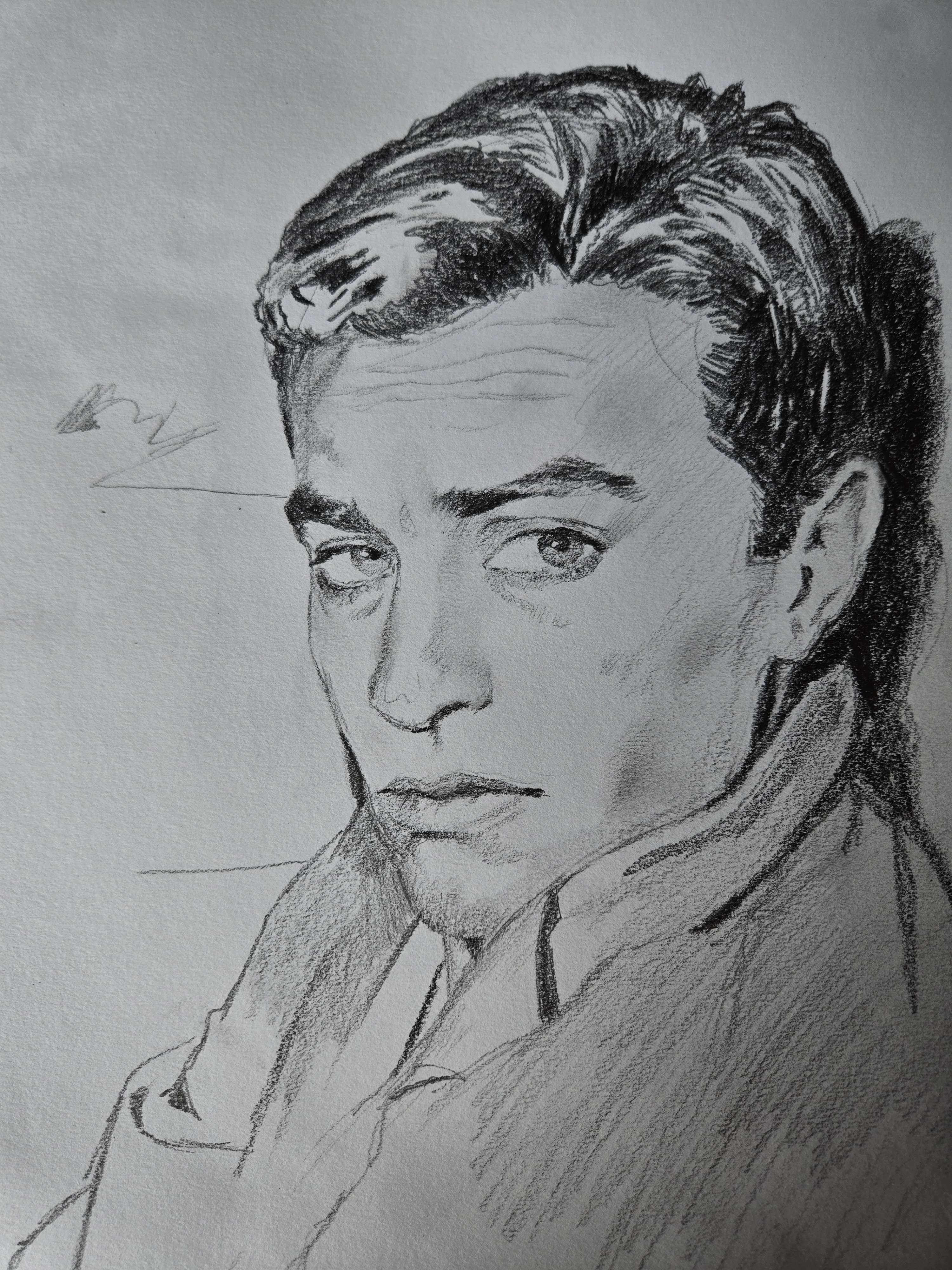 Hand-drawn charcoal portrait of a young man